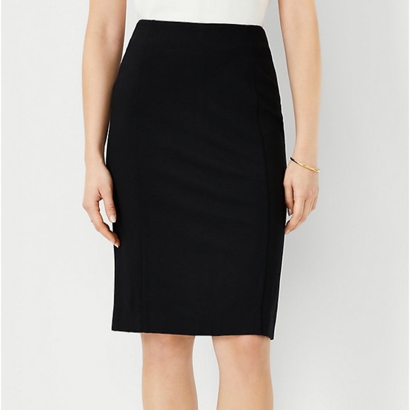 Isaac Hazan Dresses & Skirts - Issac Hazan Black Pencil skirt, size 10, back button/zip closure, back slit